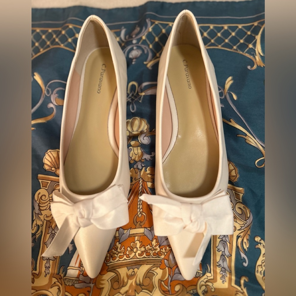 C. Paravano Pointed Toe Ballerina Flats with Ribbons 🌟